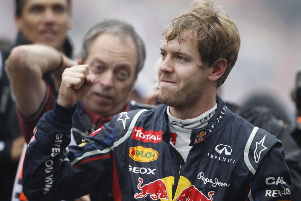 Photo: Sebastian Vettel Weltmeister Hattrick