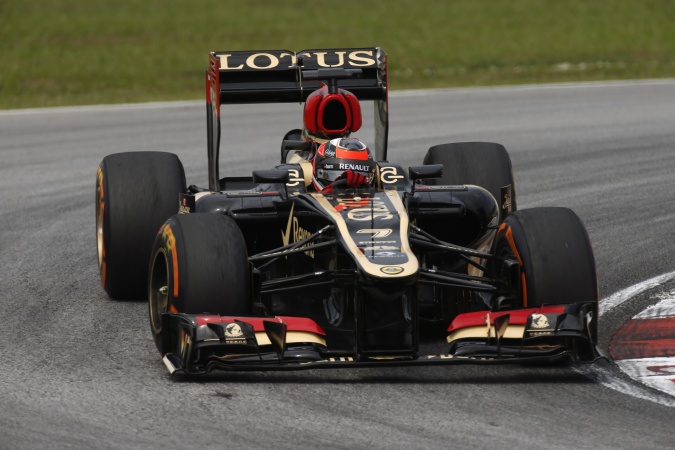 Photo: Kimi Räikkönen - Lotus F1 Team - Lotus E21 - Renault