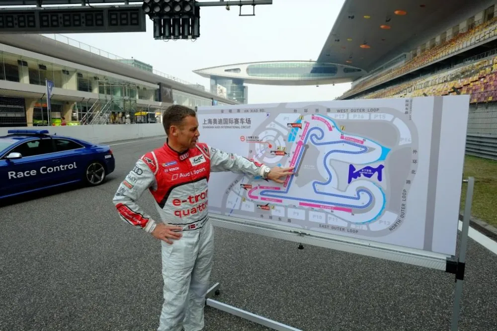 Tom Kristensen studies the course of Shanghai
