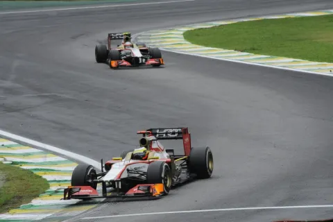 Pedro de la Rosa ahead of Narain Karthikeyan at Interlagos: The last race of 2013.