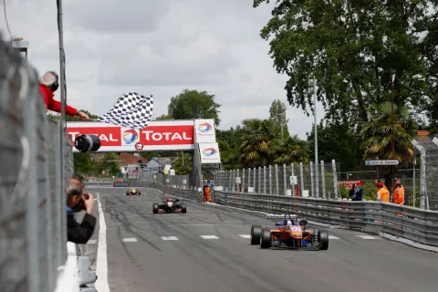 Felix Rosenqvist defeats Esteban Ocon