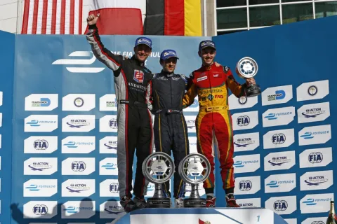 The podium: Prost wins ahead of Scott Speed and Daniel Abt