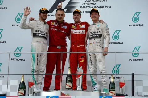 The podium in Malaysia: Vettel ahead of Hamilton and Rosberg