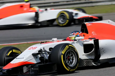 For the first time both Manor drivers in the race - and running at the finish line