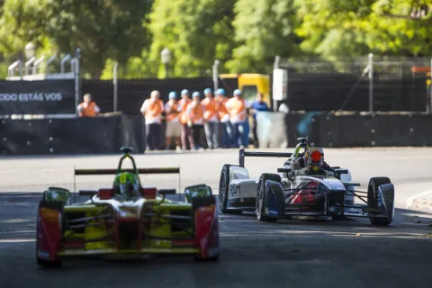 Lucas Di Grassi overtakes the broken car of Antonio Felix da Costa