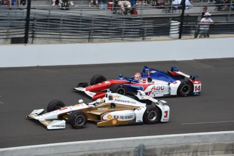 Helio Castroneves in the fight with Carlos Munos