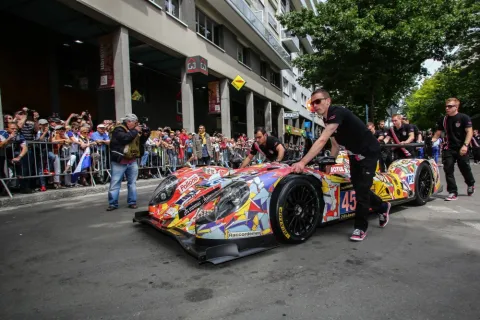 Splash of color in the field: The Art of Oak Racing Car