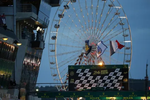 Ferris wheel behind podium: Le Mans