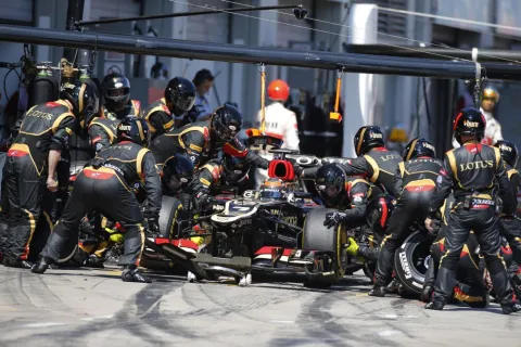Fighting for the win: Kimi in the pits