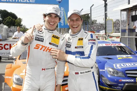First Pole Position: Gary Paffett congratulates Robert Wickens