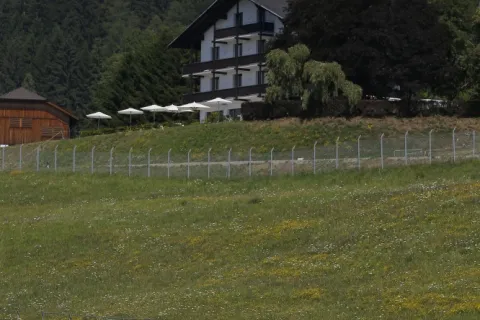 Signatech Alpine and GT Ferrari in a picturesque landscape