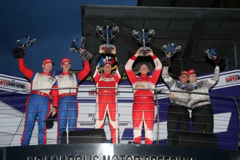 The podium of the GT class: Victory for Jeff Segal and Max Papis