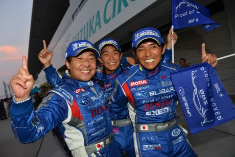 Winning trio in the GT300 class: Yamano, Sasaki, Iguchi