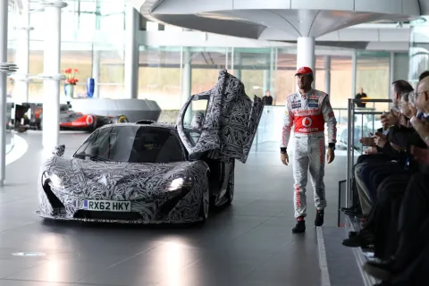 Jenson Button arrived driving a McLaren development model.