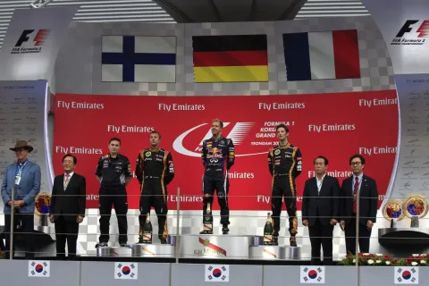 The podium: Vettel wins ahead of Raikkonen and Grosjean