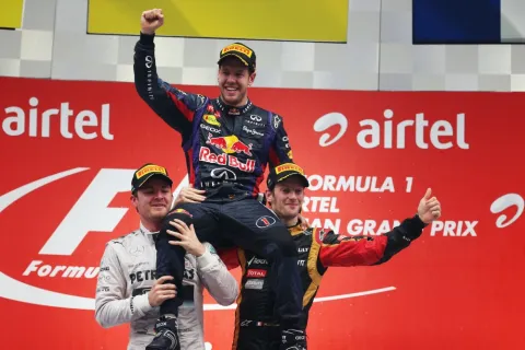 The podium: Vettel upon Rosberg and Grosjean